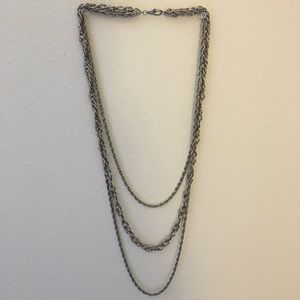 Chunky chain silver necklace.
